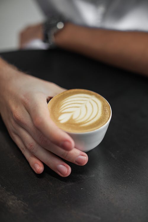 Close-Up Photo of a Latte in a Teacup