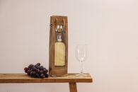 Clear Glass Bottle on Brown Wooden Table