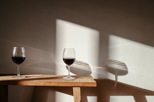 Wine Glasses on Wooden Table