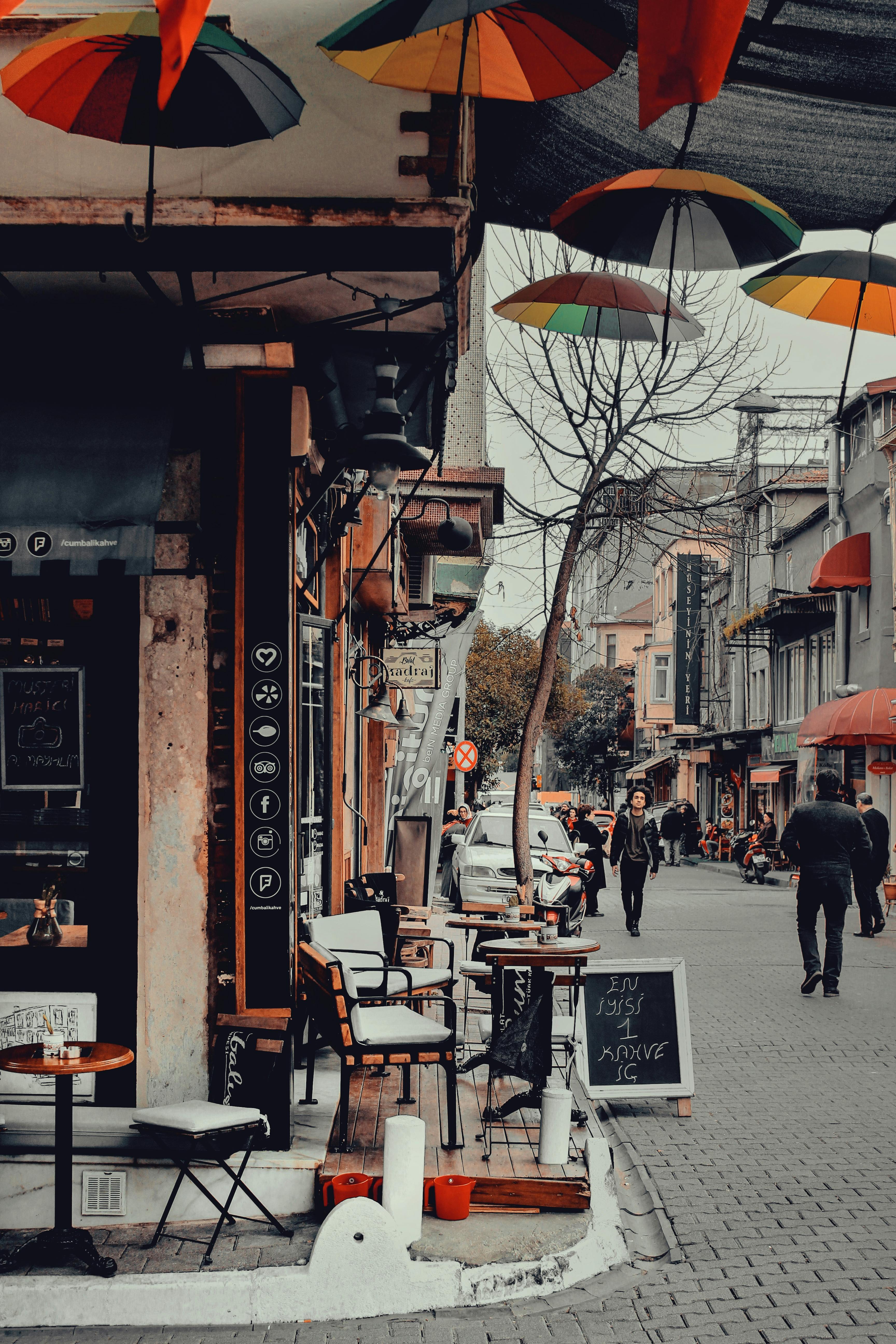 Colorful Umbrellas Hanging outside a Café · Free Stock Photo