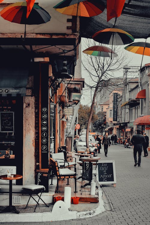 Free Colorful Umbrellas Hanging outside a Café Stock Photo