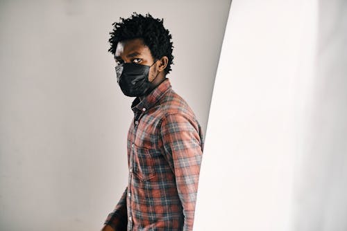 Man in Plaid Long Sleeve Shirt and Face Mask