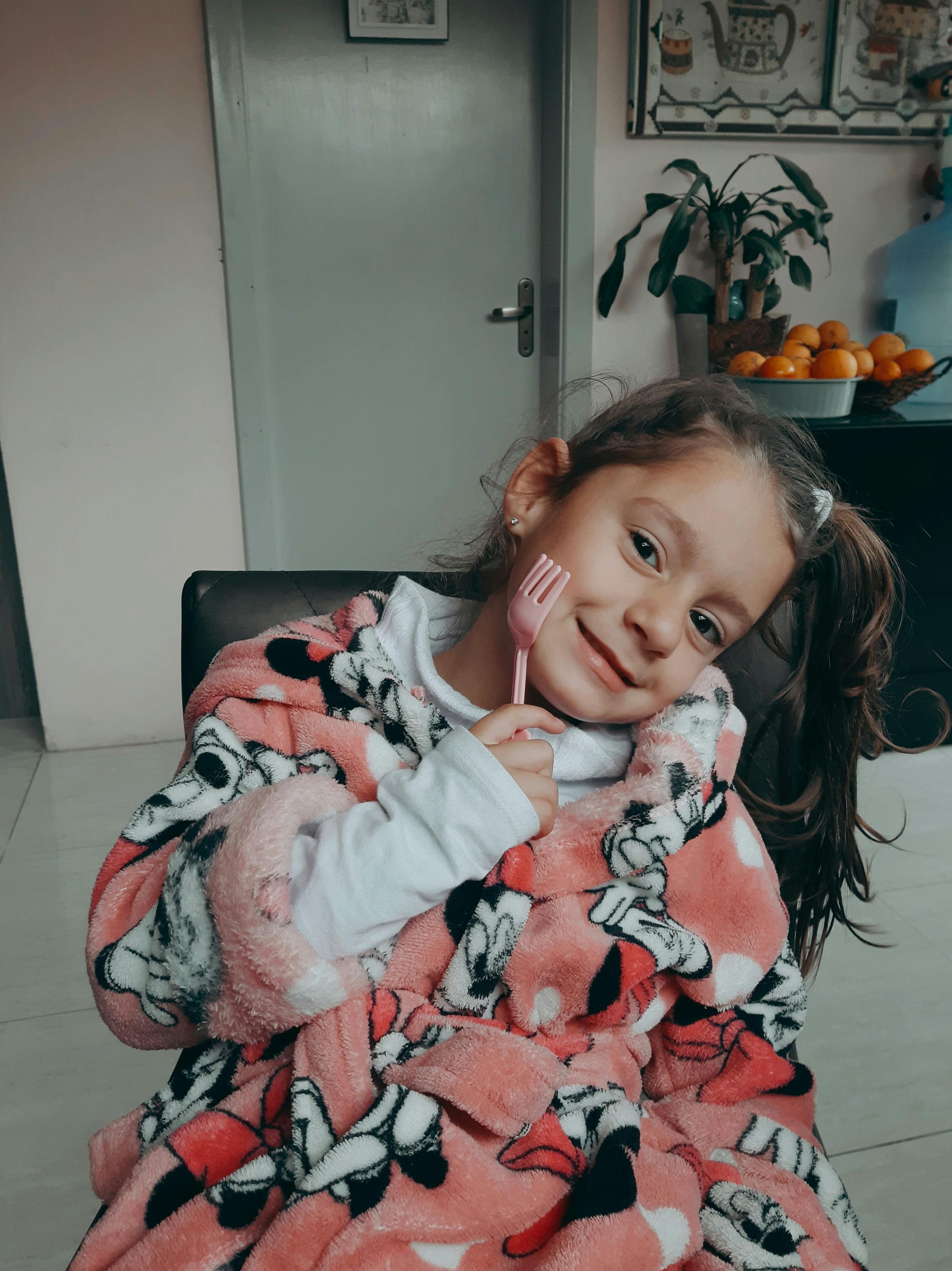 Astrology-themed illustration with constellations and zodiac symbols glowing against a dark background