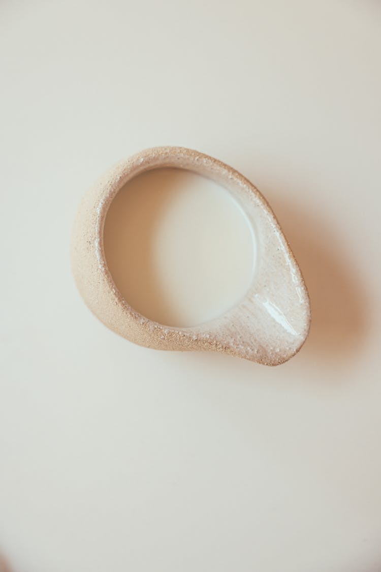 White Ceramic  Jar On The Table