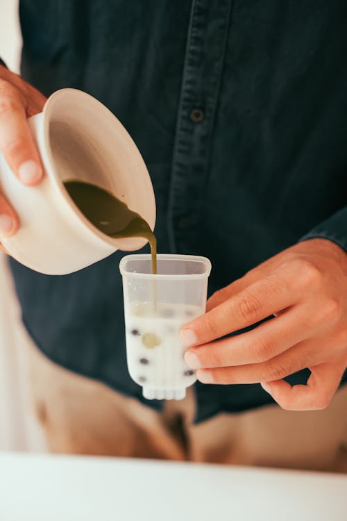 A Person Holding a Bowl