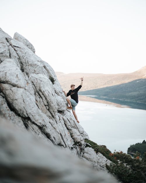 A Man Climbing the Rocky Mountain