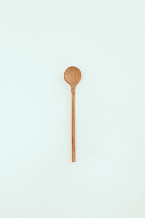 Wooden Spoon on White Surface