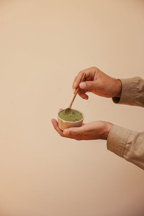 Gratis stockfoto met biologisch, groene thee, houten lepel