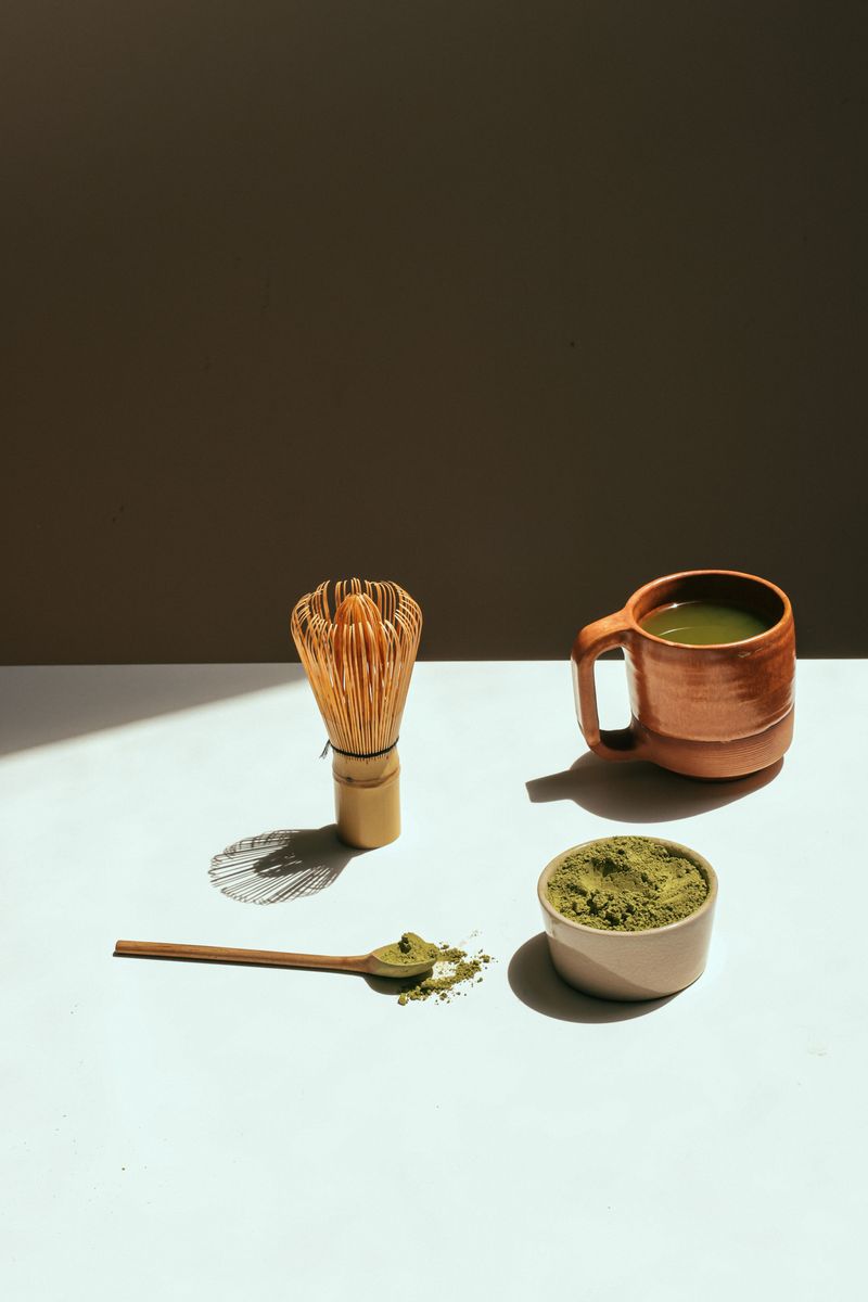 A cup of green tea on a table