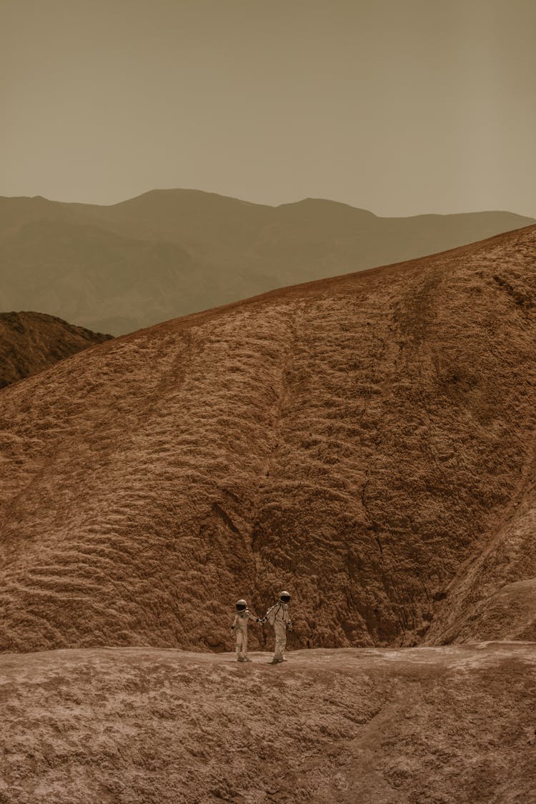 Astronauts Holding Hands On Mars