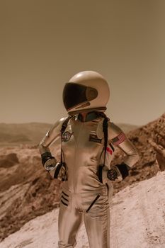 Astronaut in spacesuit exploring a Mars-like desert landscape. Sci-fi adventure theme.