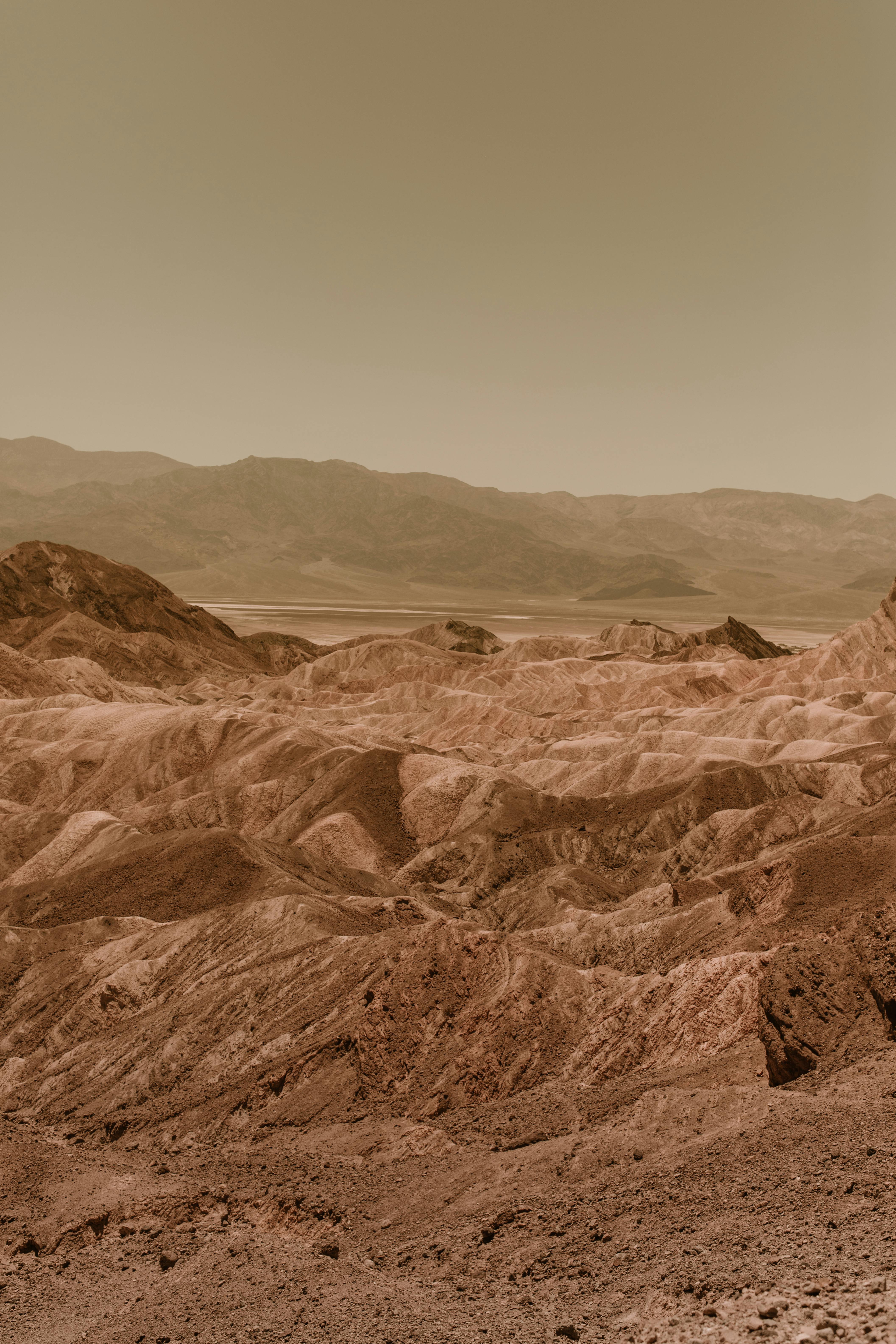 A breathtaking view of a rocky desert landscape with clear skies, showcasing natural beauty.