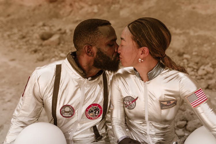 An Astronaut Couple Kissing