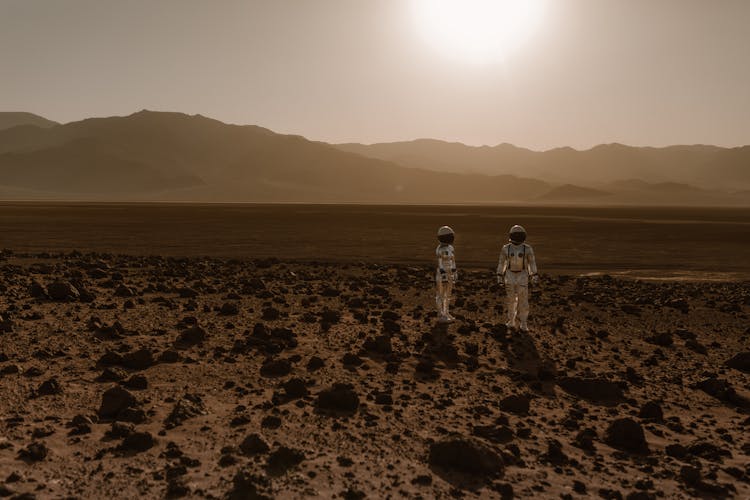 Astronauts Standing On Ground