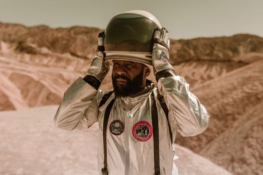Man in Brown Jacket Wearing Black Helmet