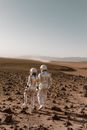 Back View of Astronauts Holding Hands while Walking in a Desolate Planet