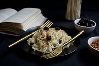 Stainless Steel Fork on Blue Ceramic Plate