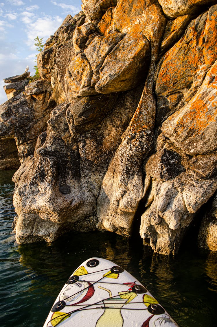 Kayak Near Rocky Coast