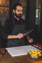 Chef Sharpening a Knife