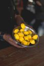 Person Holding a Bowl of Patty Pan Squash