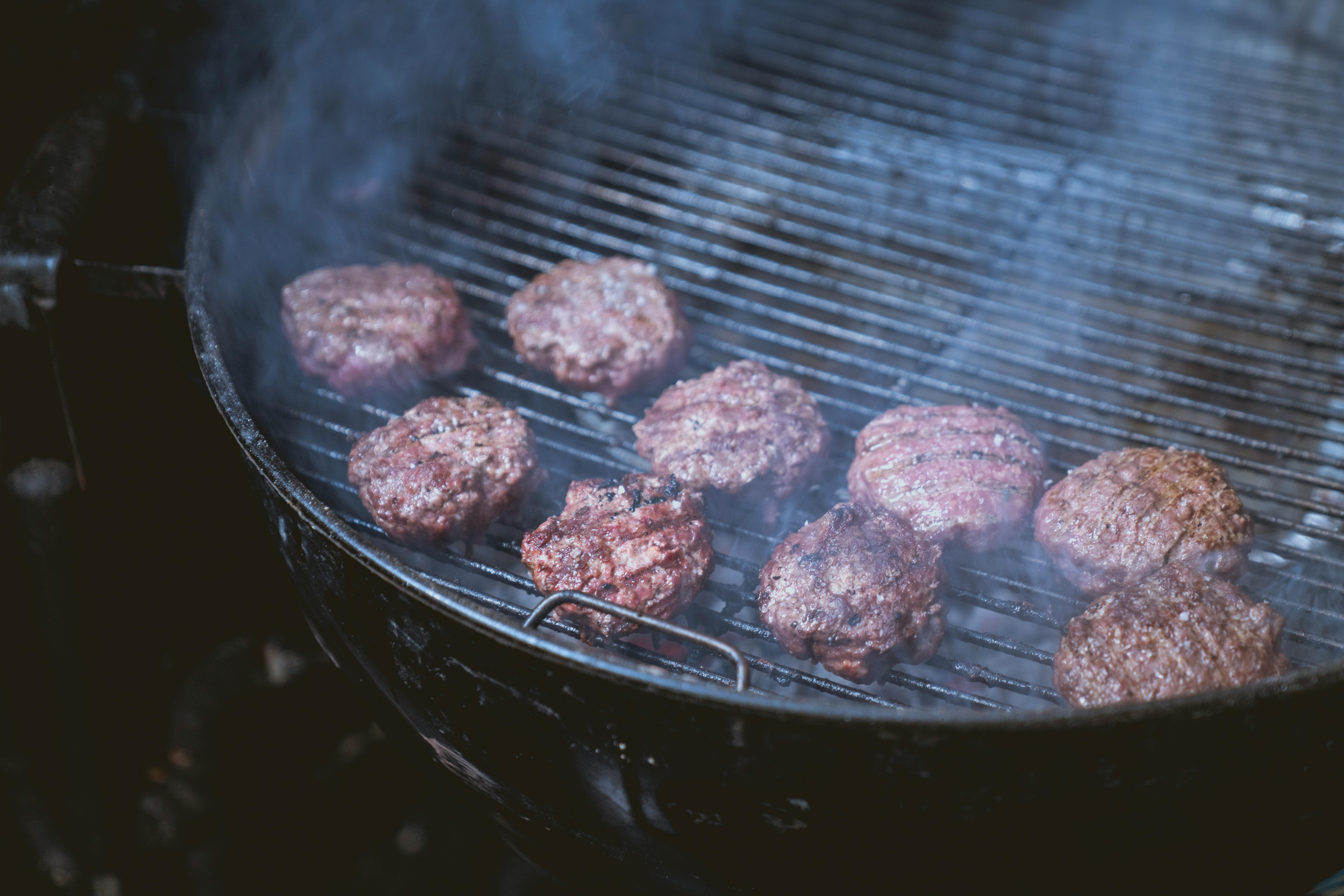 cooking patties on a griller