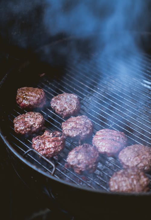 Free Black Round Food on Black Charcoal Grill Stock Photo