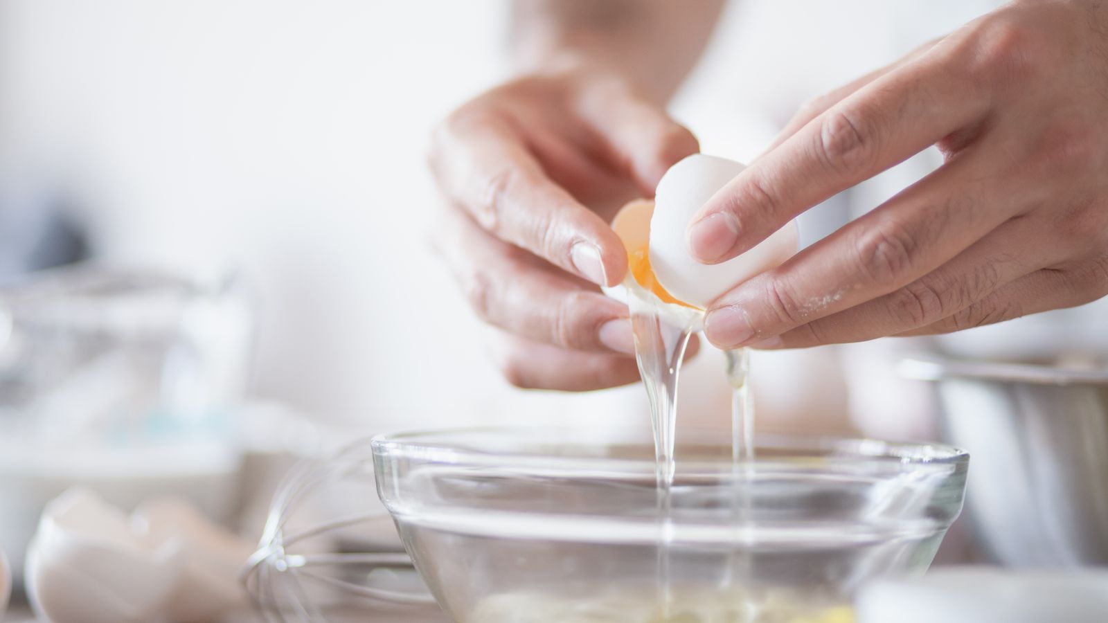 Hands separating egg yolk and white into a bowl — photo by Los Muertos Crew on Pexels Hands separating egg yolk and white into a bowl