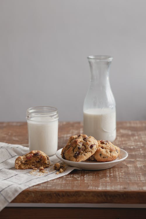Chocolate Cookies and Glass of Milk Photo