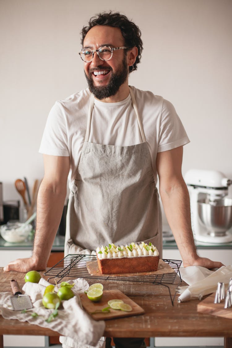 Smiling Man Wearing An Apron