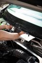 Close-up of Fixing a Part of a Car