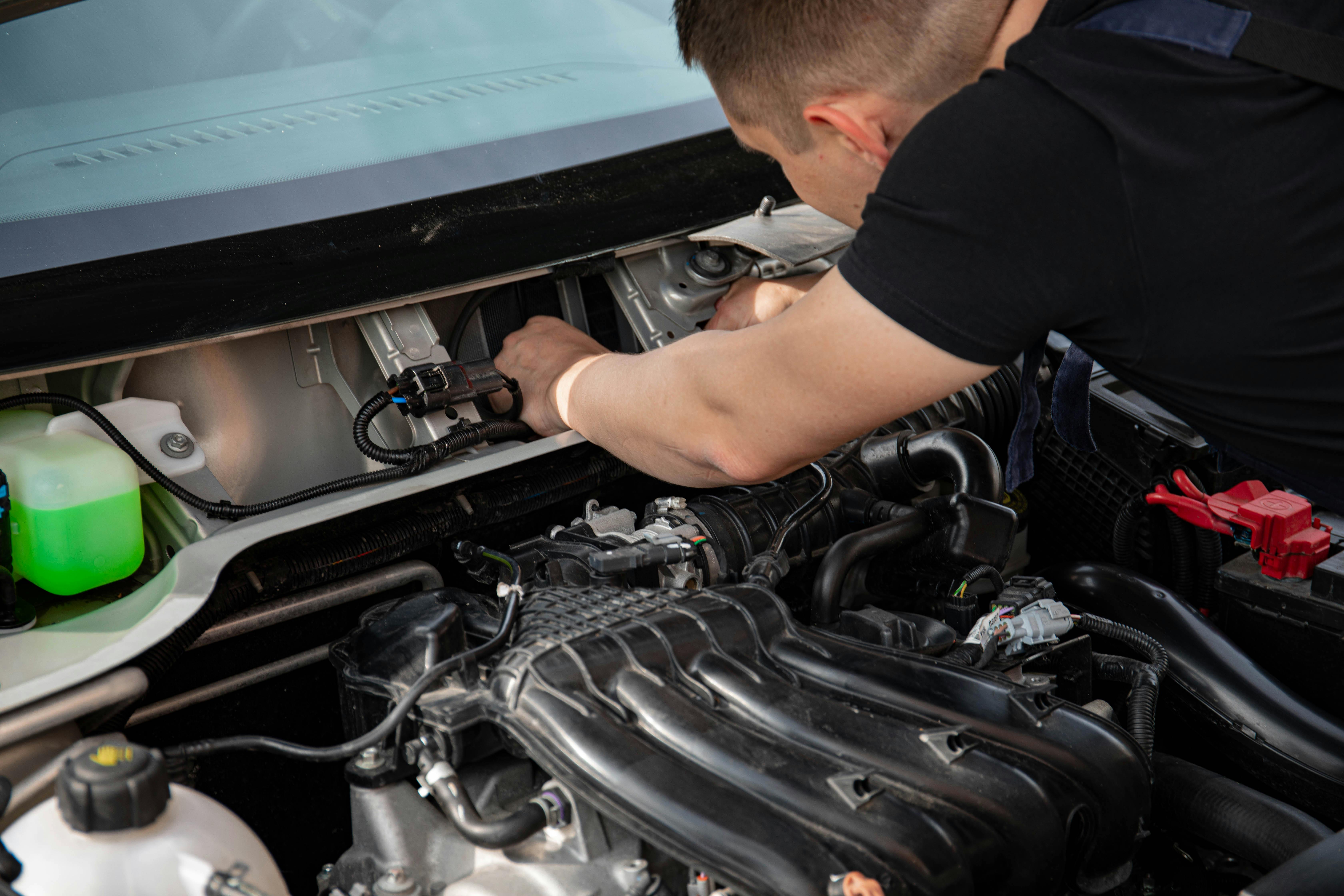 starting car with hood open