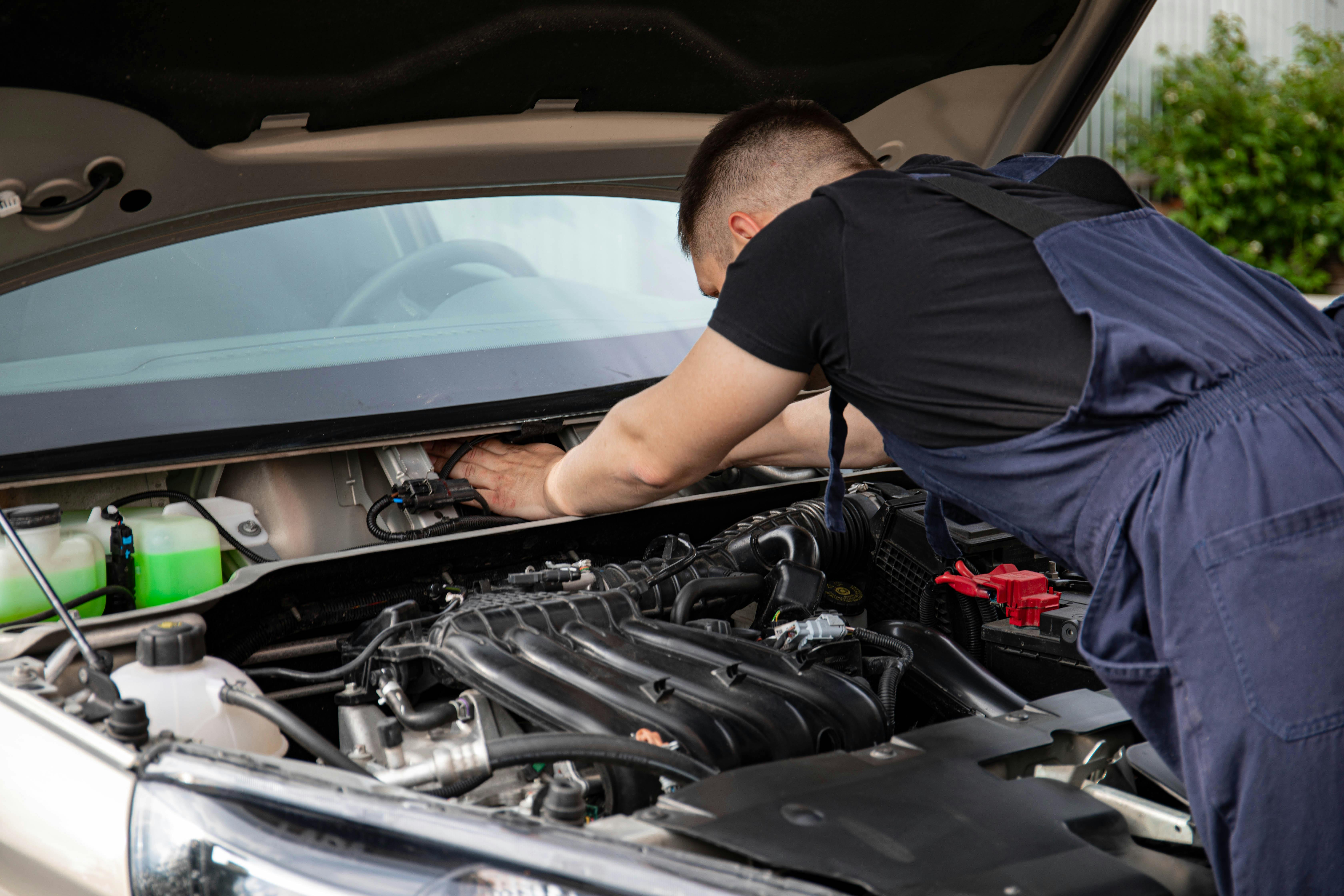 Man Fixing Car