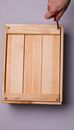 Unscrewing a Wooden Box