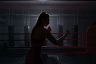 Silhouette of a Woman Doing Boxing Pose