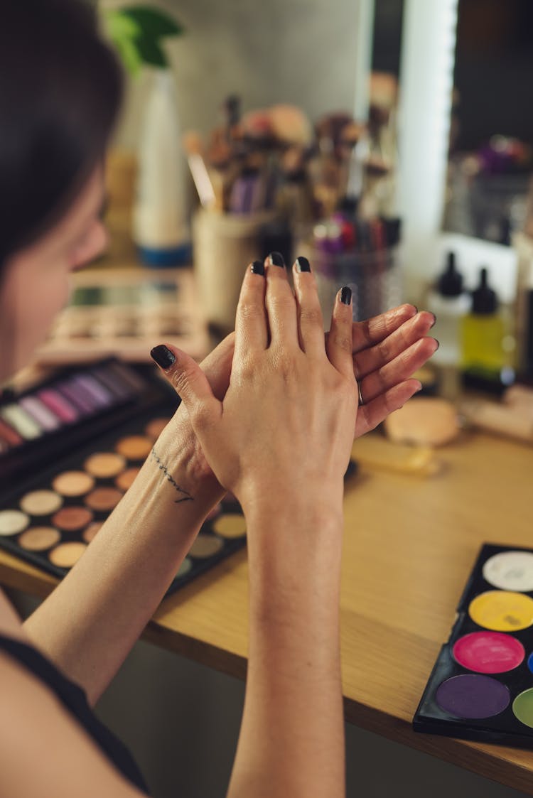 Woman With Black Nail Polish