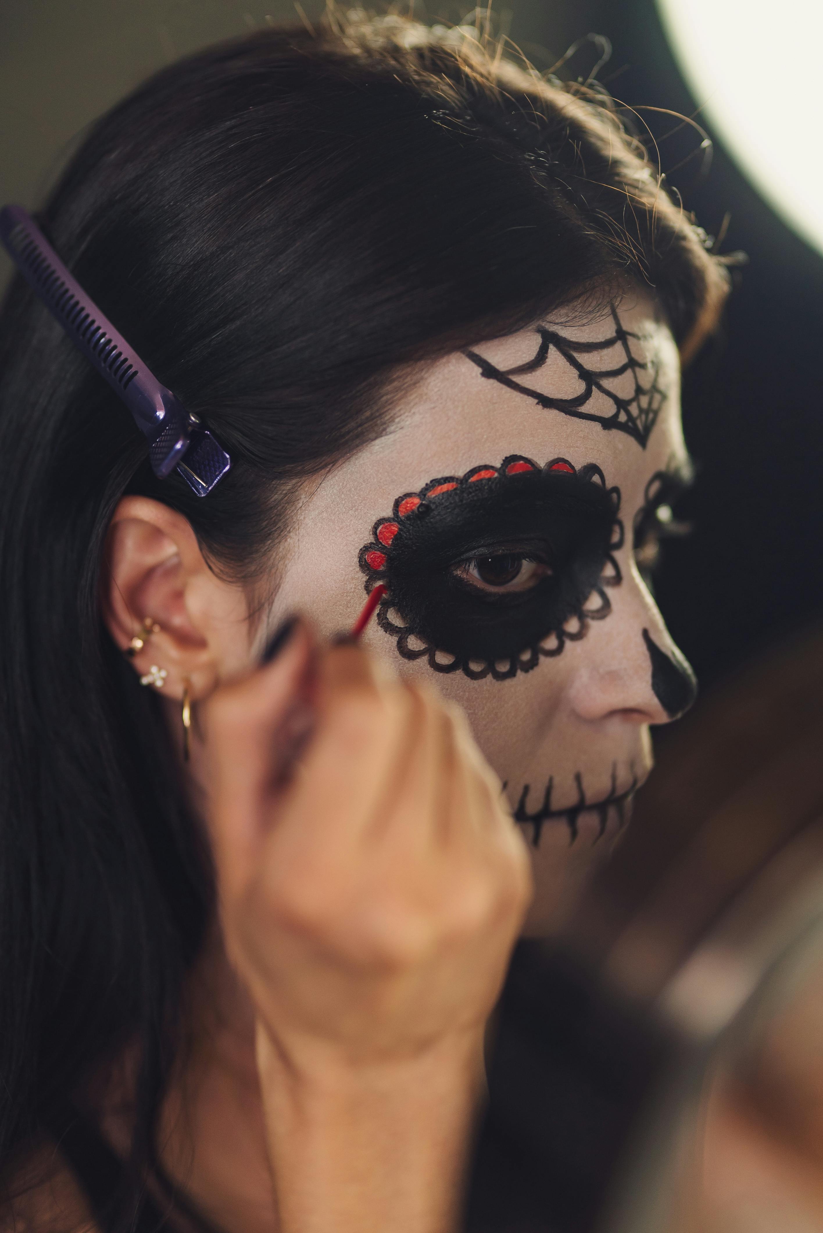 a woman applying makeup