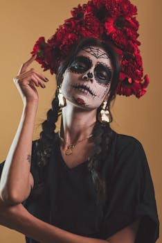 Artistic portrait of a Catrina with face paint and a vibrant floral headpiece, celebrating Mexican culture.