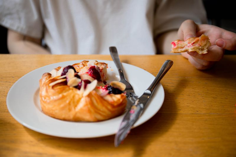 Fresh fruit danish with glossy berries from the bakery