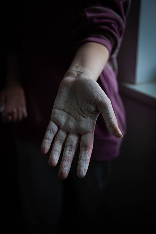 Hand study against a dark ground, photo by Sergey Meshkov on Pexels
