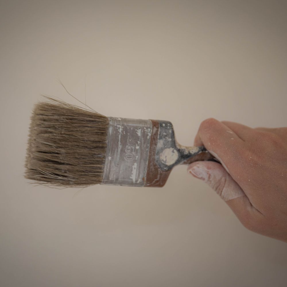 Plastering and Skimming in Hackney Central — clean edges cut in around trim and sockets