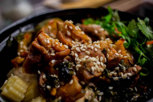 Savor the rich textures and flavors of this sesame-topped chicken dish with vegetables.