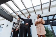 Man and Woman Standing on a Building