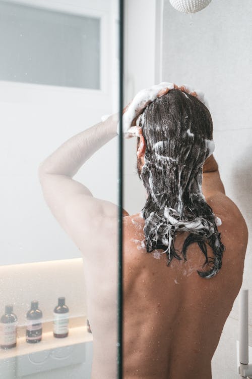 Photo of a Person Shampooing Long Hair