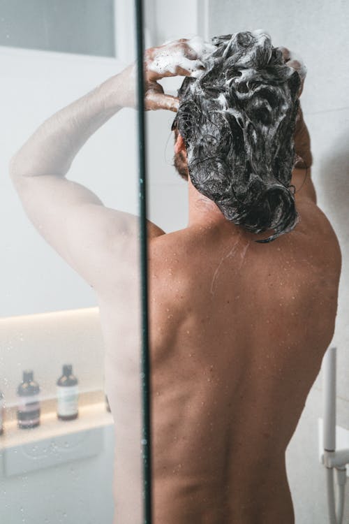 Back View Of A Person Bathing