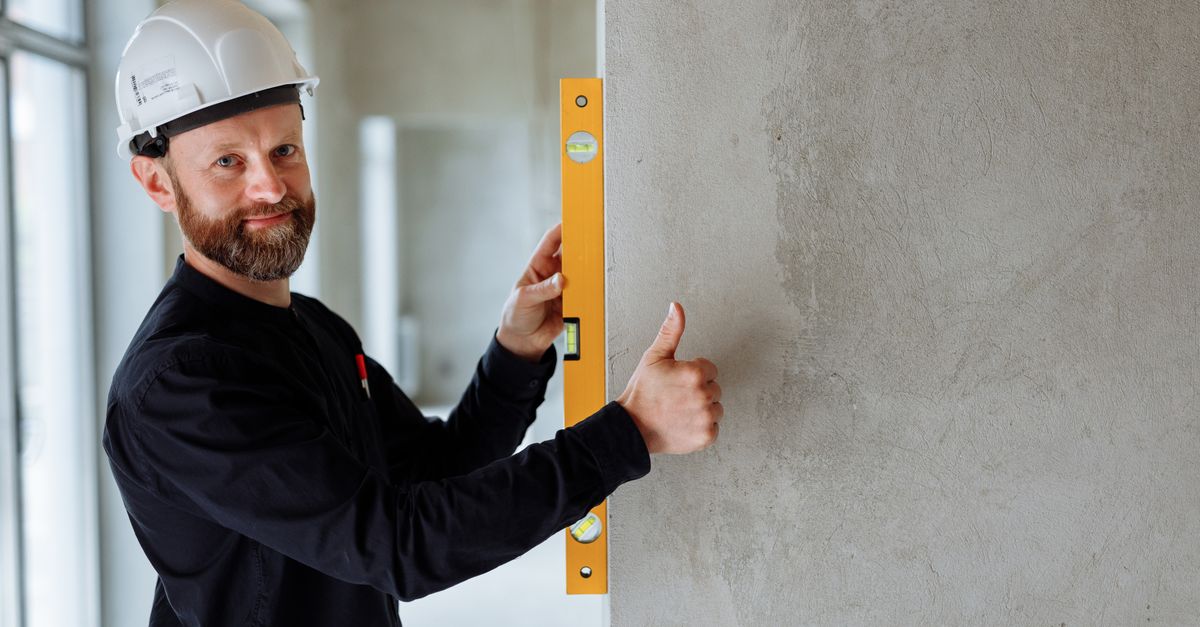 A ventricle door in a residential home slightly misaligned from the door frame.