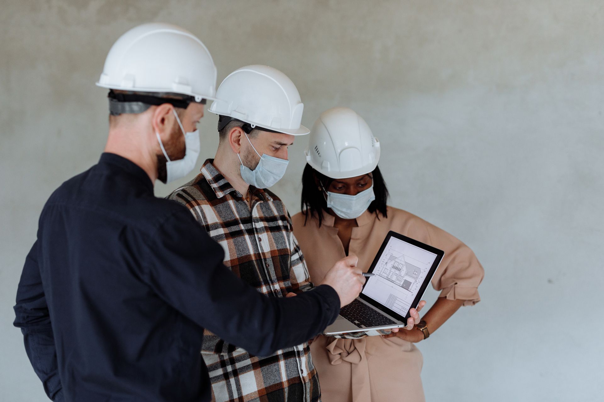 Engineers Looking at the Screen