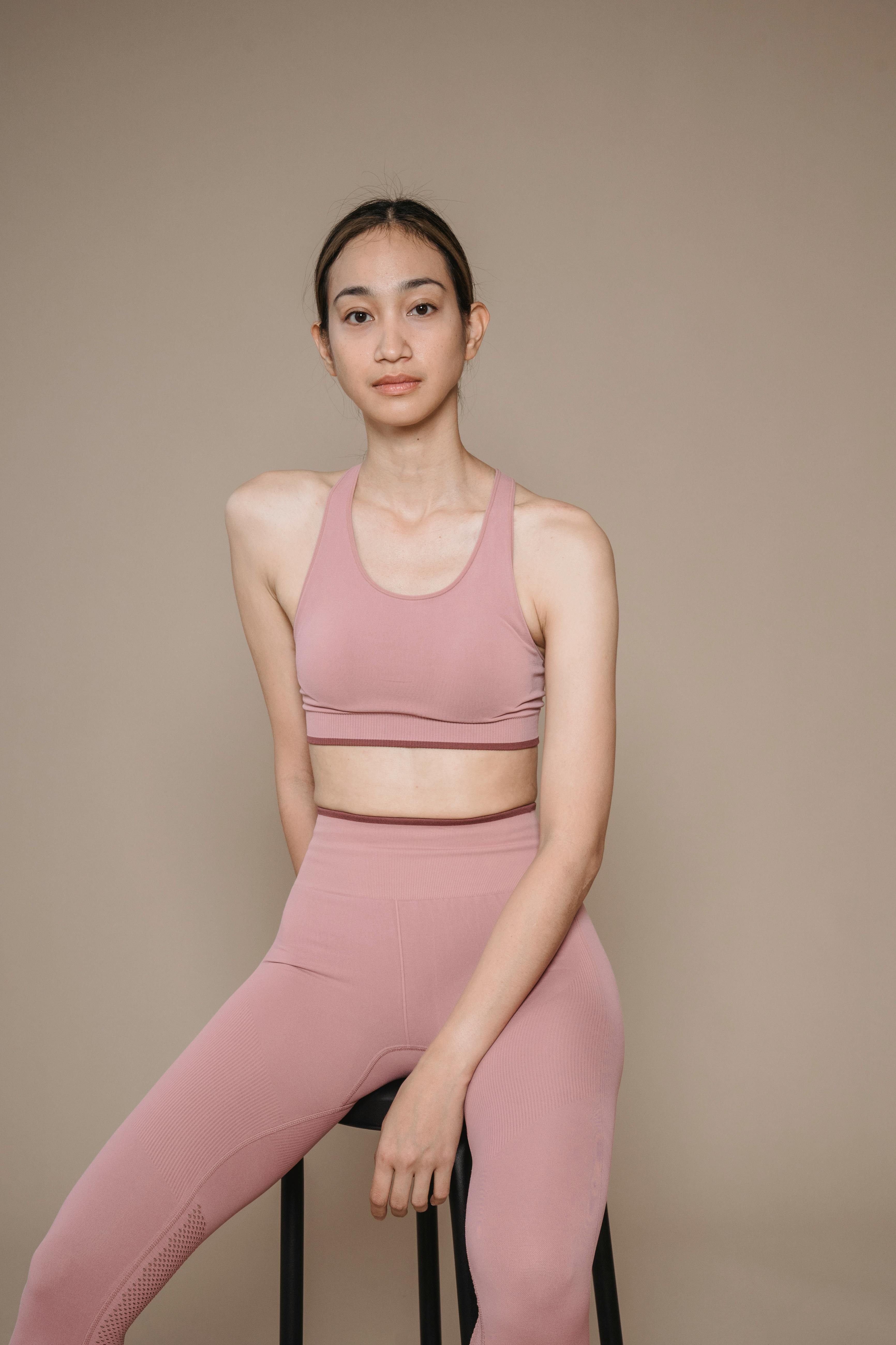 Photo of a Woman in Pink Activewear Looking at the Camera · Free