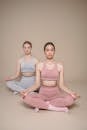 Women in Activewear Meditating