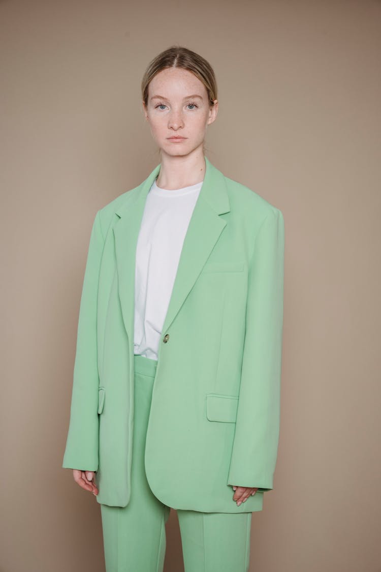 A Woman In Green Pantsuit