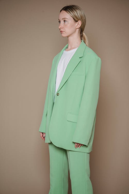 A Woman wearing Green Suit